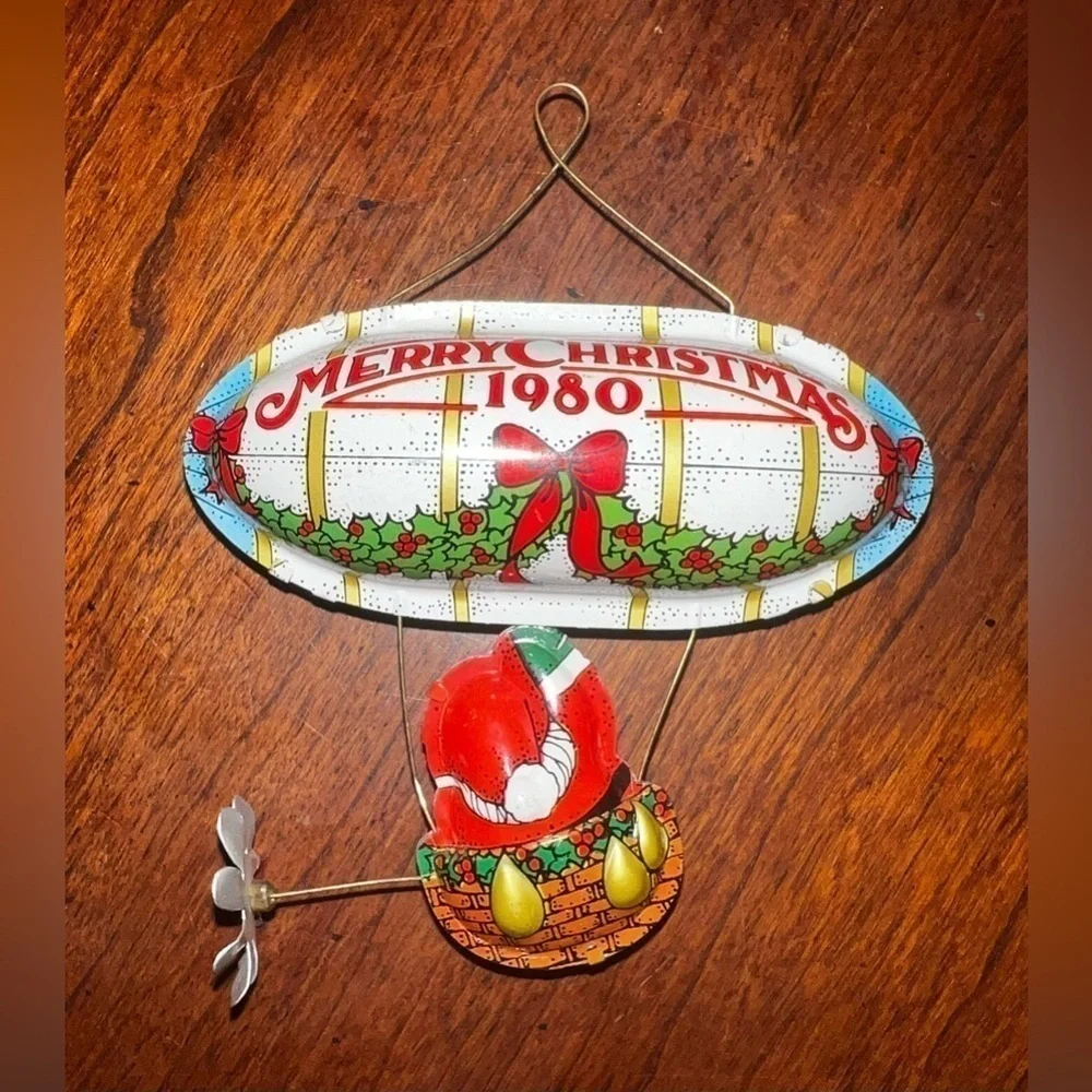 Hallmark Vintage Santa in a Hot Air Balloon with a Moving Propeller from 1980.